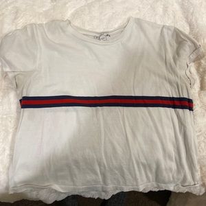 white cropped tee with red and blue stripe